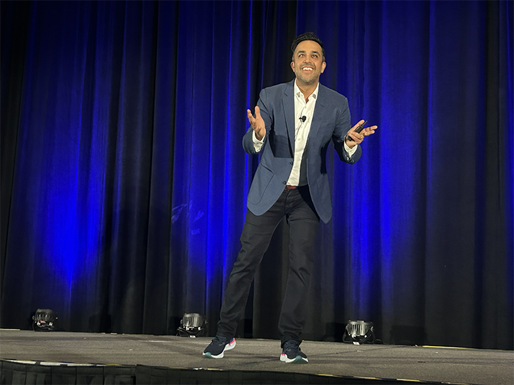 Neil Pasricha onstage at Connect