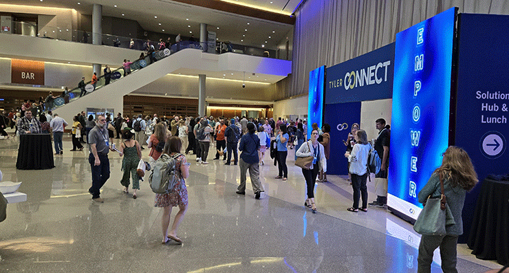 Thousands of attendees walking halls